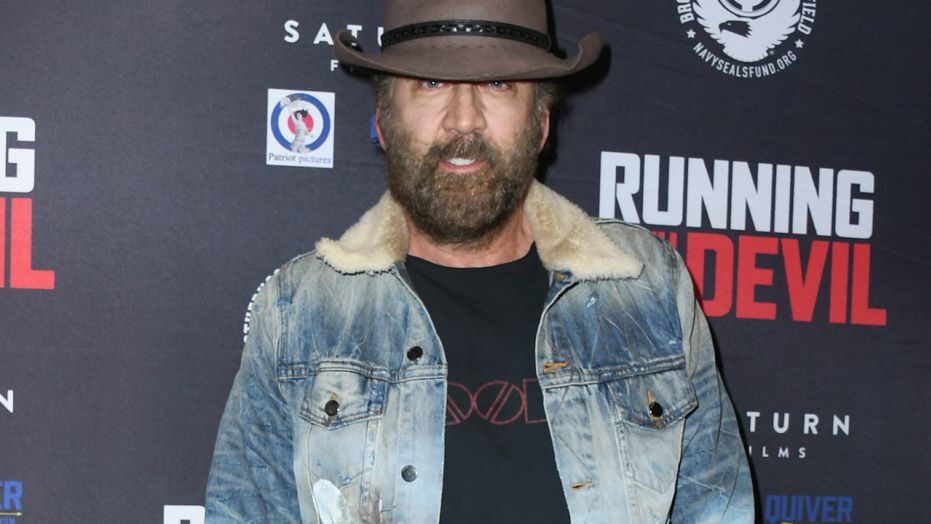 Nicolas Cage arrives unrecognizable at ‘Running with the Devil’ film premiere